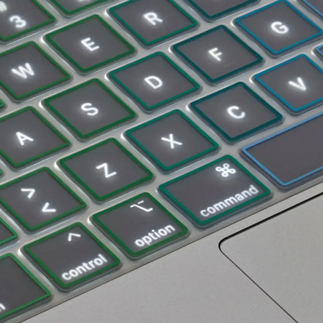 Tastaturcover - Philbert MacBook Pro 13–16" - Transparent/Rainbow - EU-layout